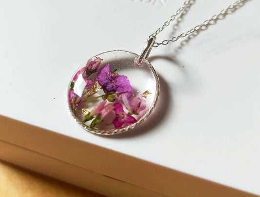 Real flowers preserved necklace, heather and pink Alyssum, 22mm solid 925 silver circle on solid 925 silver chain. handmade in Yorkshire.
