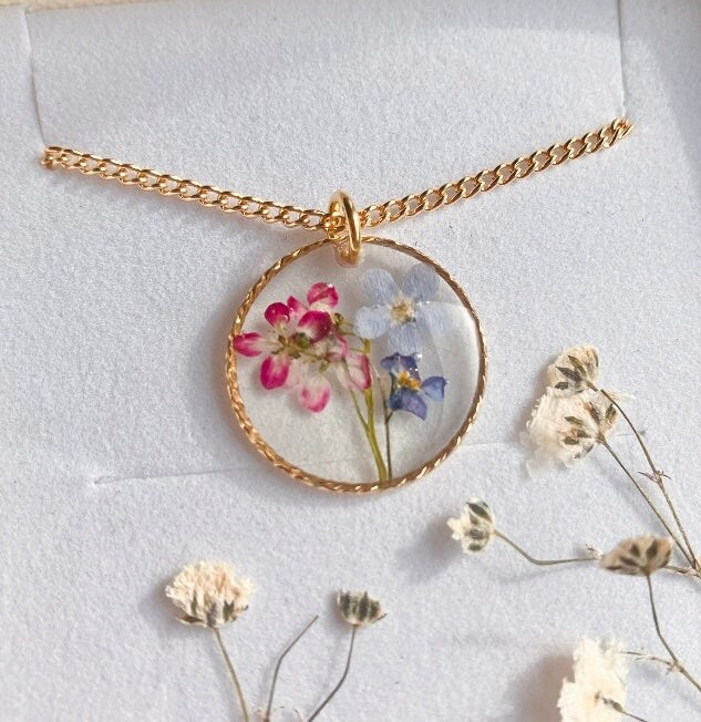 Forget me not and Alyssum real flowers preserved in a gold filled circle necklace. On a gold filled or gold plated chain. Christmas gift