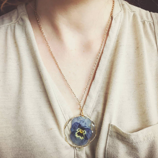 Real viola flower botanical terrarium pendant necklace on a 20in gold plated or 14k gold filled chain. Organic circle, large pansy