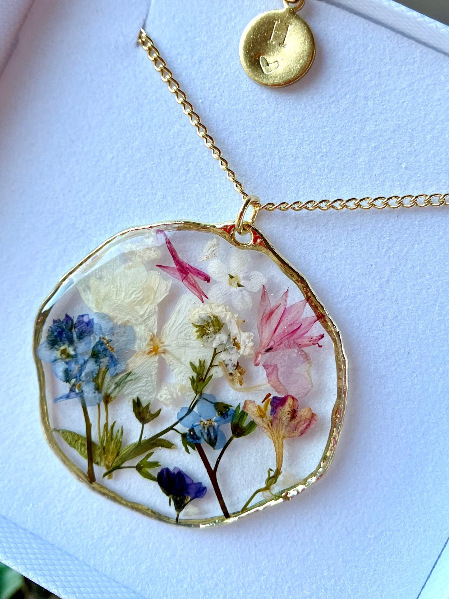 Cornflower, forget me nots, lobelia terrarium pendant necklace on a 20in gold plated or 14k gold filled chain. Organic, large circle.