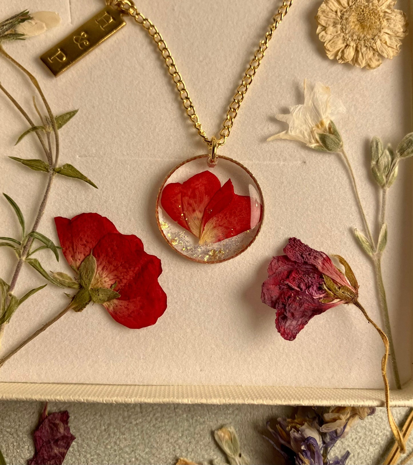 Valentine’s Day forever rose necklace, real pressed petals. In gold filled circle on gold filled or g plated chain, handmade in Yorkshire