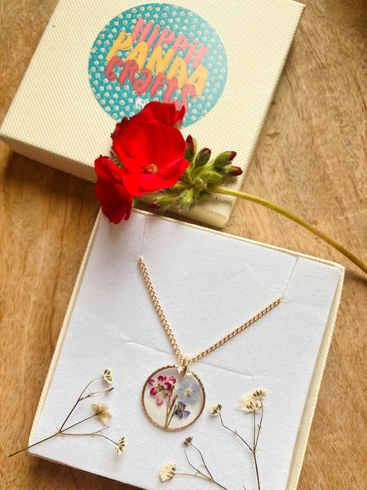 Forget me not and Alyssum real flowers preserved in a gold filled circle necklace. On a gold filled or gold plated chain. Christmas gift