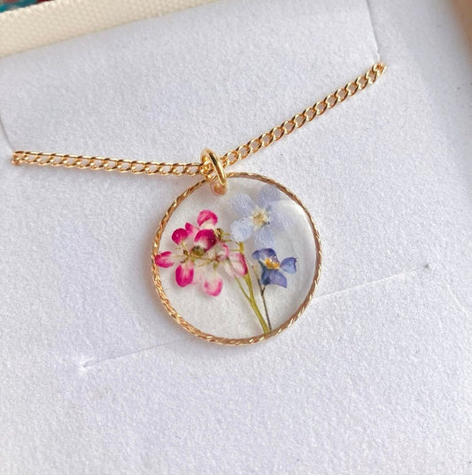 Forget me not and Alyssum real flowers preserved in a gold filled circle necklace. On a gold filled or gold plated chain. Christmas gift