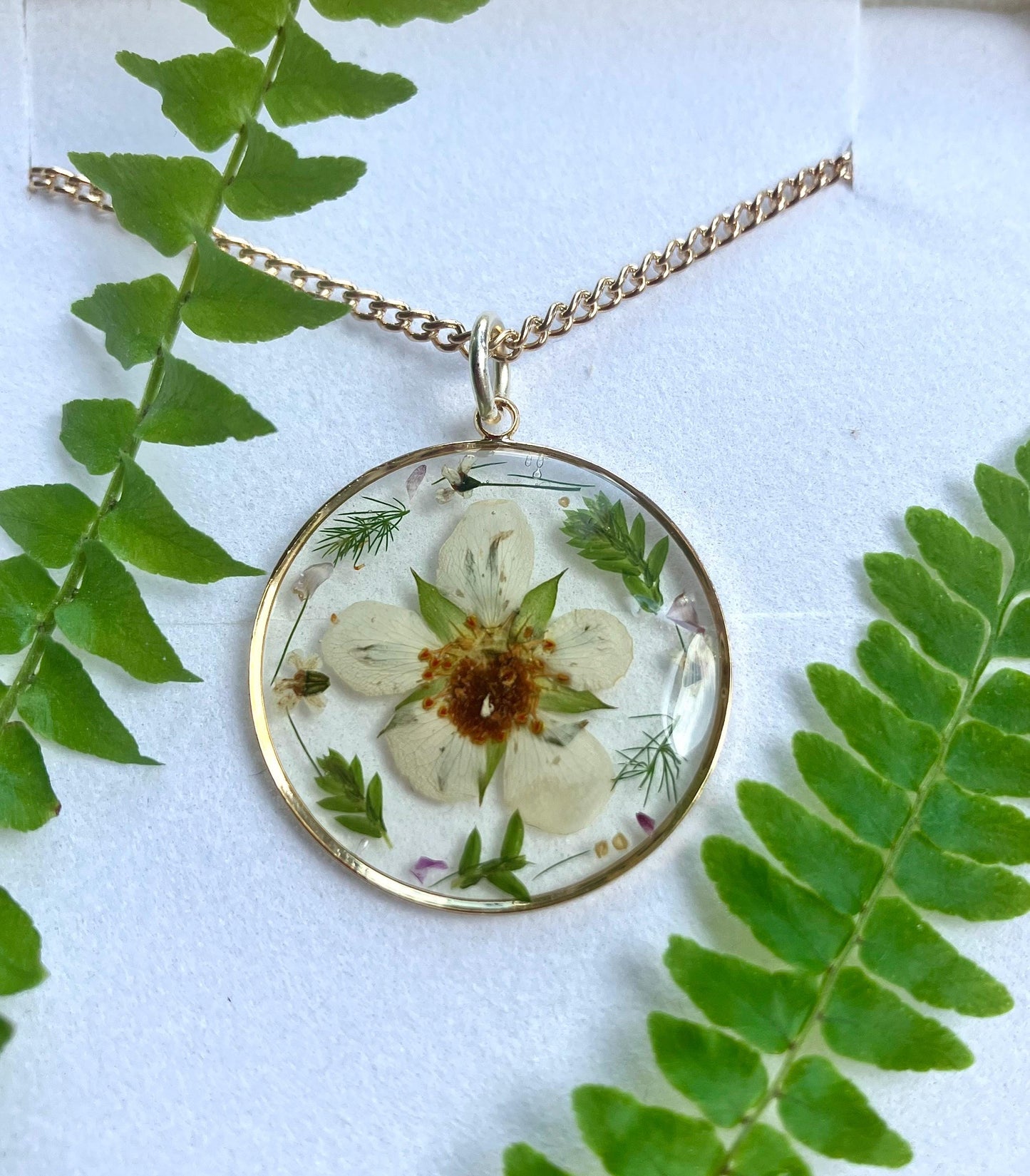 Real pressed strawberry flower necklace with dainty green fern leaves and queens Anne’s lace  on gold plated or 14k gold filled. Personalise